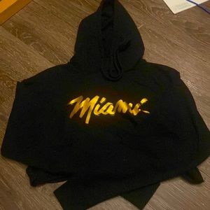 I am selling a cropped miami hoodie.